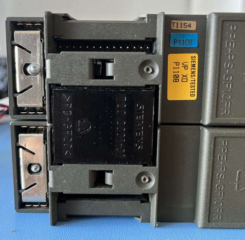 CPU 314 (bottom) connected to CP 343-1 Lean (top) (CP 343-1 Lean like all other modules have two connectors for daisy chaining, here the bottom connector is connected to CPU)